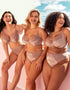 Models are wearing sizes 32H and 32G