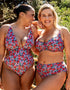 Models are wearing sizes 32G/GG and 32H